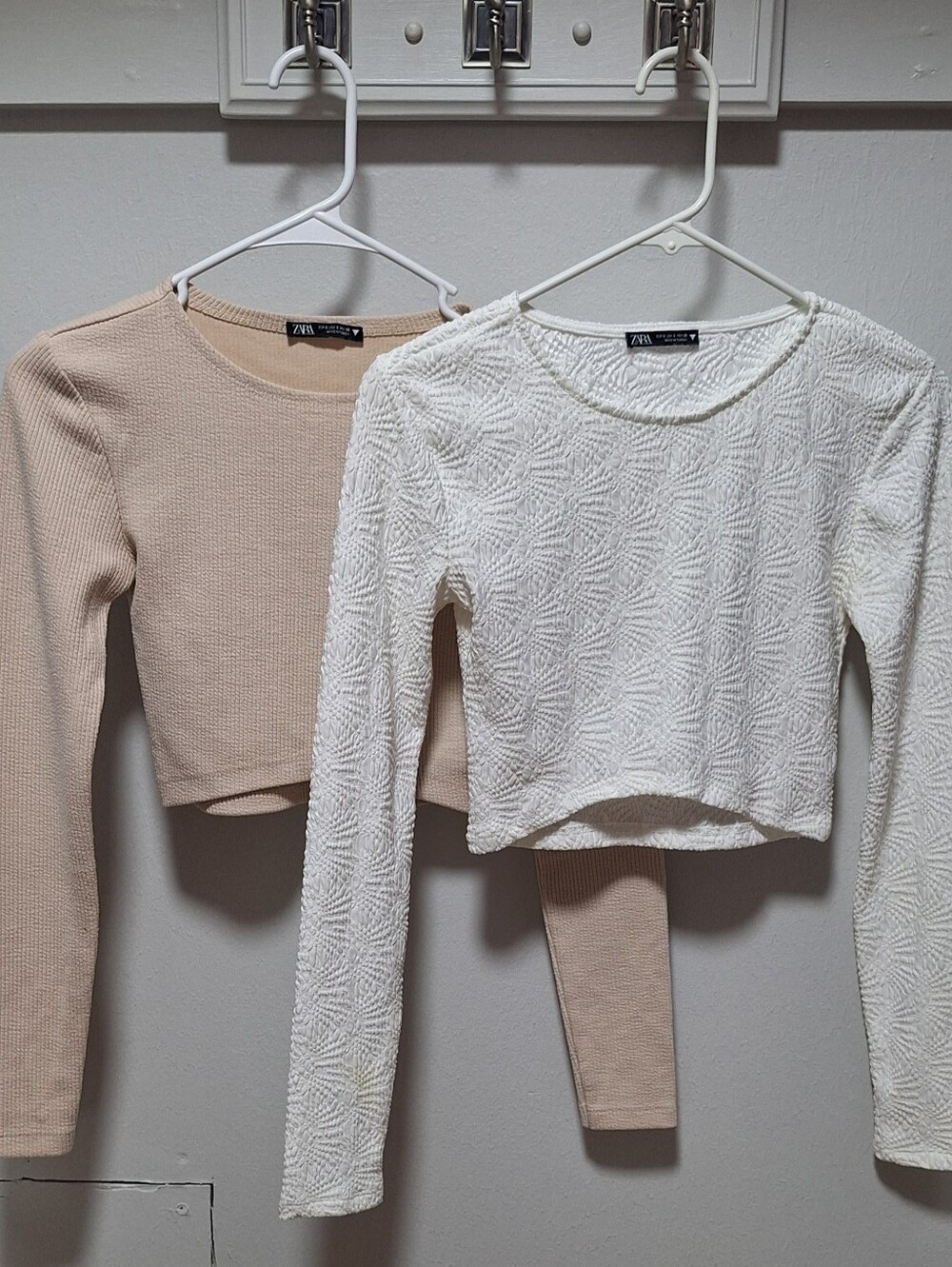2 Zara long-sleeve crop tops with textured surfaces. size S